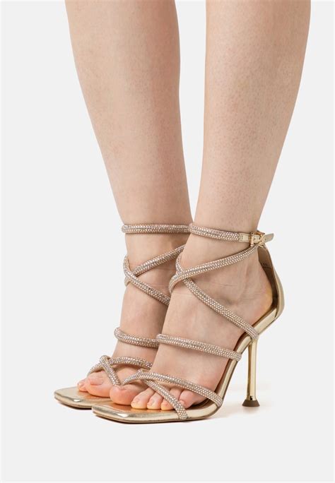 sneakers michael kors dames met goud|michael kors gold heels.